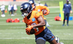 Marvin Mims leaves practice early with an apparent injury