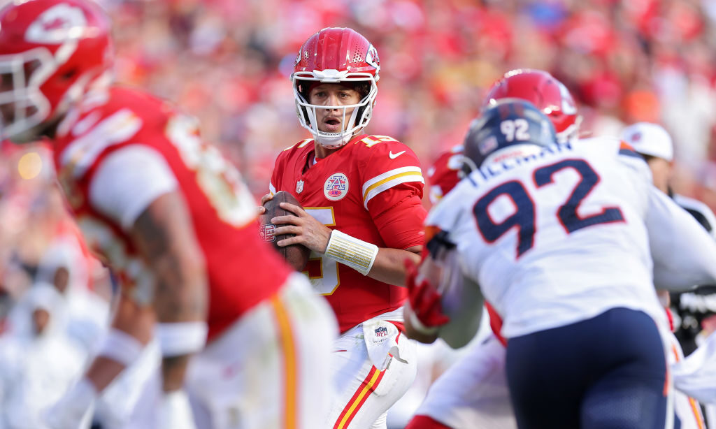 KANSAS CITY, MISSOURI - NOVEMBER 10: Patrick Mahomes #15 of the Kansas City Chiefs looks to pass in the fourth quarter of a game against the Denver Broncos at GEHA Field at Arrowhead Stadium on November 10, 2024 in Kansas City, Missouri.