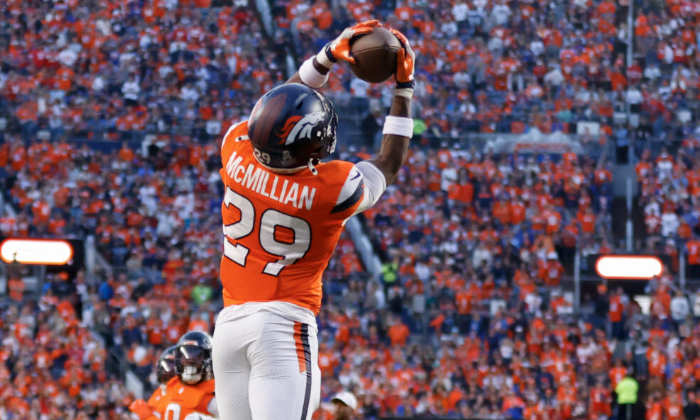 DENVER, COLORADO - NOVEMBER 16: Ja'Quan McMillian #29 of the Denver Broncos makes an interception a...
