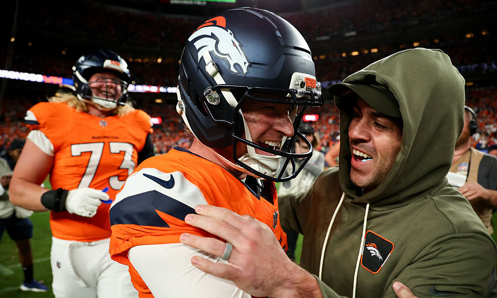 DENVER, COLORADO - NOVEMBER 16: Wil Lutz #3 of the Denver Broncos celebrates after his game winning...