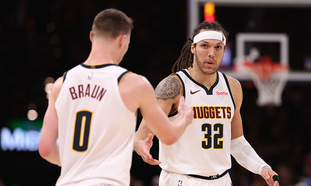 OKLAHOMA CITY, OKLAHOMA - MAY 05: Aaron Gordon #32 (R) and Christian Braun #0 of the Denver Nuggets...