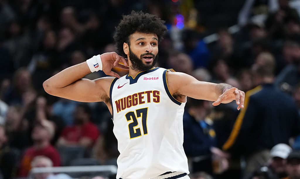 INDIANAPOLIS, INDIANA - DECEMBER 03: Jamal Murray #27 of the Denver Nuggets celebrates after making...