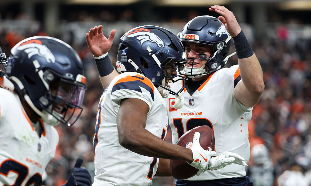 LAS VEGAS, NEVADA - DECEMBER 07: Marvin Mims Jr. #19 of the Denver Broncos celebrates with teammate...