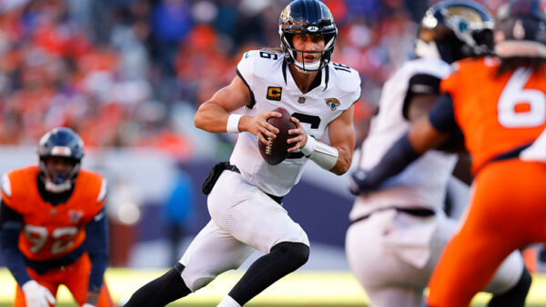 DENVER, COLORADO - DECEMBER 21: Trevor Lawrence #16 of the Jacksonville Jaguars looks to pass during the first quarter against the Denver Broncos at Empower Field At Mile High on December 21, 2025 in Denver, Colorado.