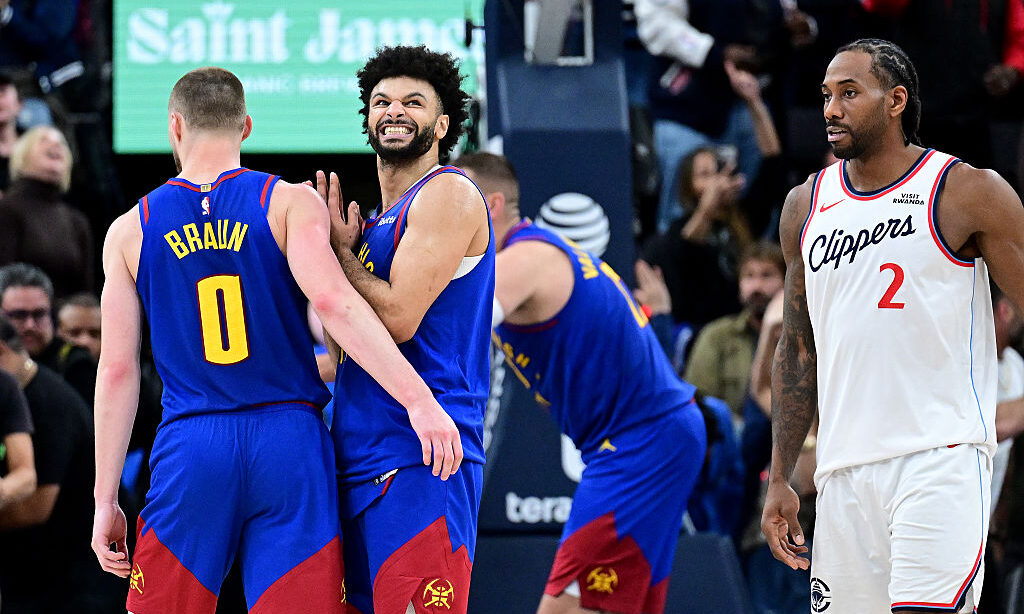 INGLEWOOD, CALIFORNIA - FEBRUARY 19: Jamal Murray #27 of the Denver Nuggets, center, reacts after m...