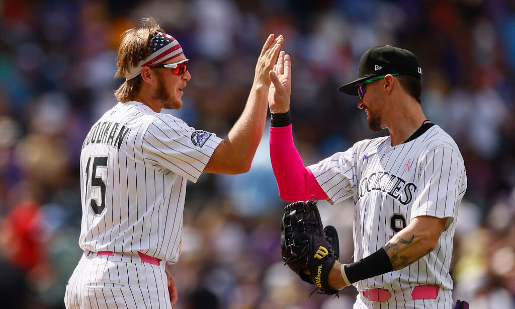 DENVER, CO - MAY 11: Hunter Goodman #15 and Brenton Doyle #9 of the Colorado Rockies celebrate afte...