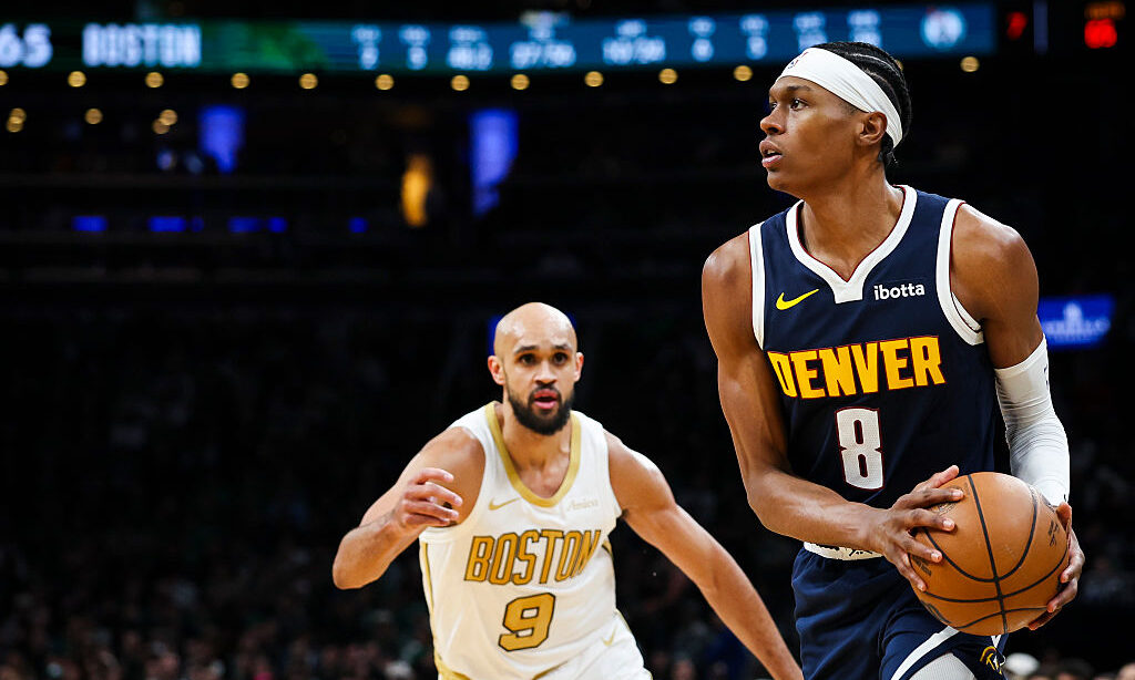 BOSTON, MA - JANUARY 7: Peyton Watson #8 of the Denver Nuggets looks to shoot the ball while Derric...