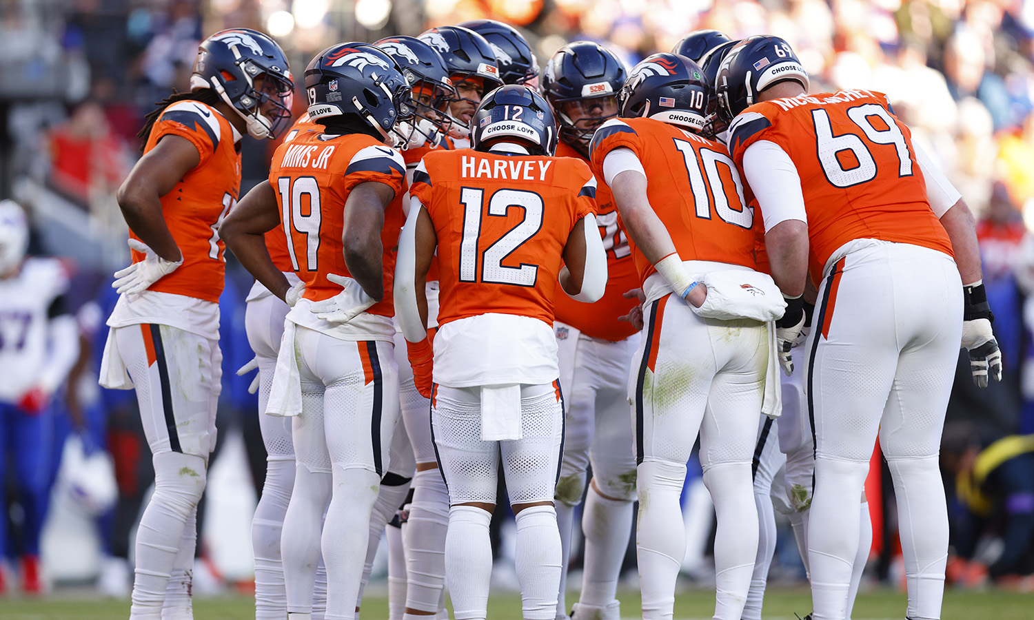 Denver Broncos huddle...