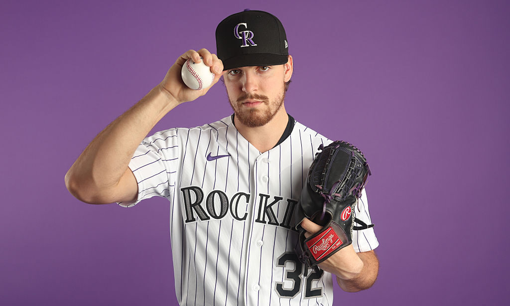 SCOTTSDALE, ARIZONA - FEBRUARY 18: Chase Dollander #32 of the Colorado Rockies poses for a portrait...