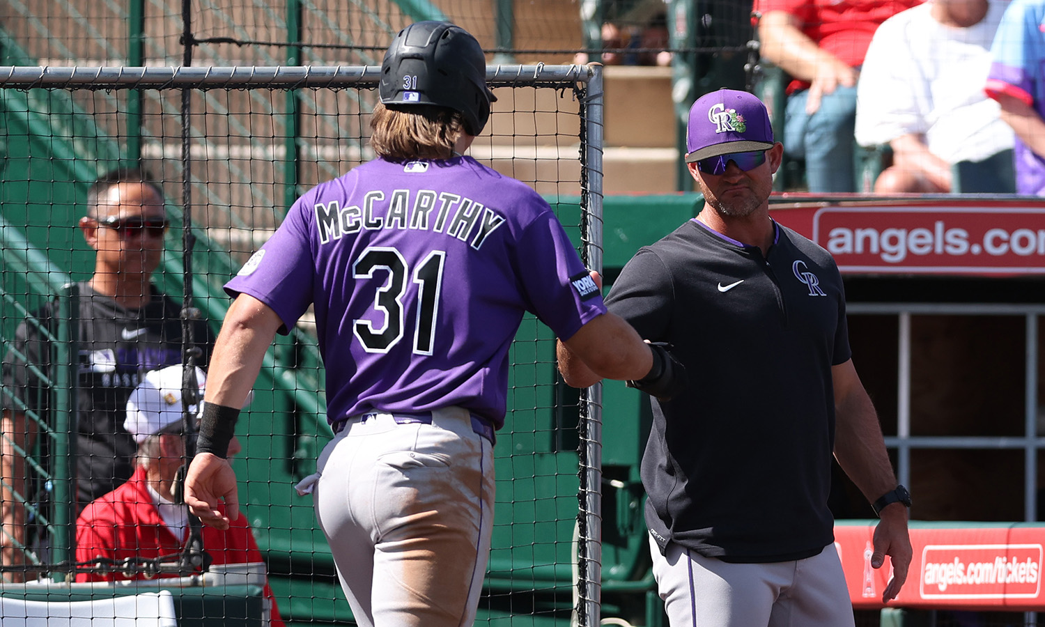 Rockies manager Warren Schaeffer with Jake McCarthy...