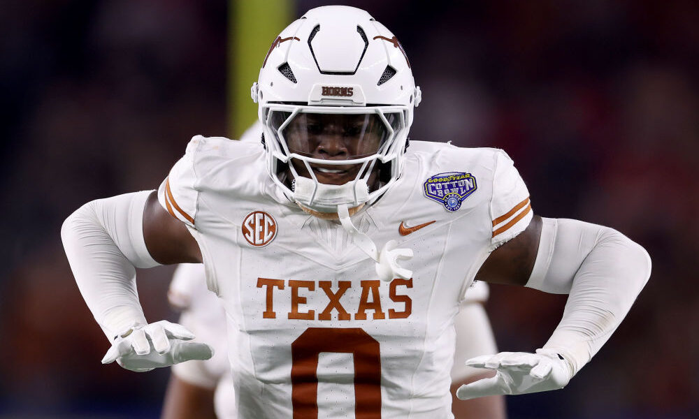 ARLINGTON, TEXAS - JANUARY 10: Anthony Hill Jr. #0 of the Texas Longhorns celebrates in the second ...