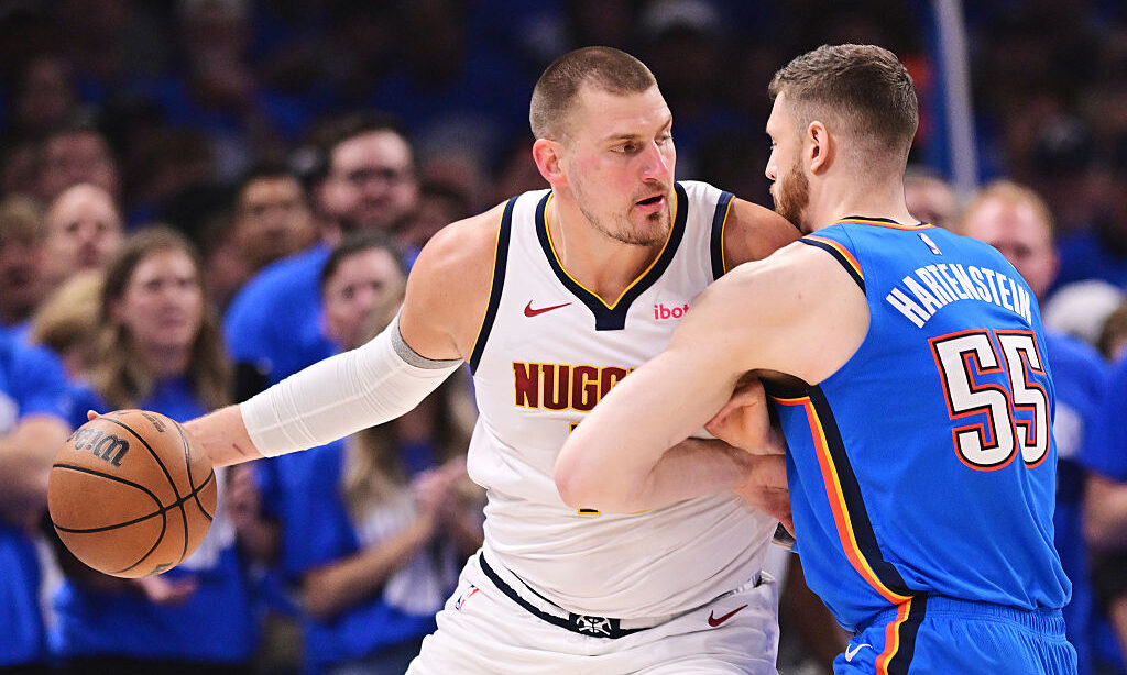 OKLAHOMA CITY, OKLAHOMA - MAY 18: Nikola Jokic #15 of the Denver Nuggets works against Isaiah Harte...