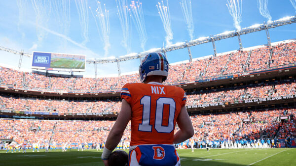 DENVER, COLORADO - JANUARY 04: Bo Nix #10 of the Denver Broncos looks on before the game against the Los Angeles Chargers at Empower Field At Mile High on January 04, 2026 in Denver, Colorado.