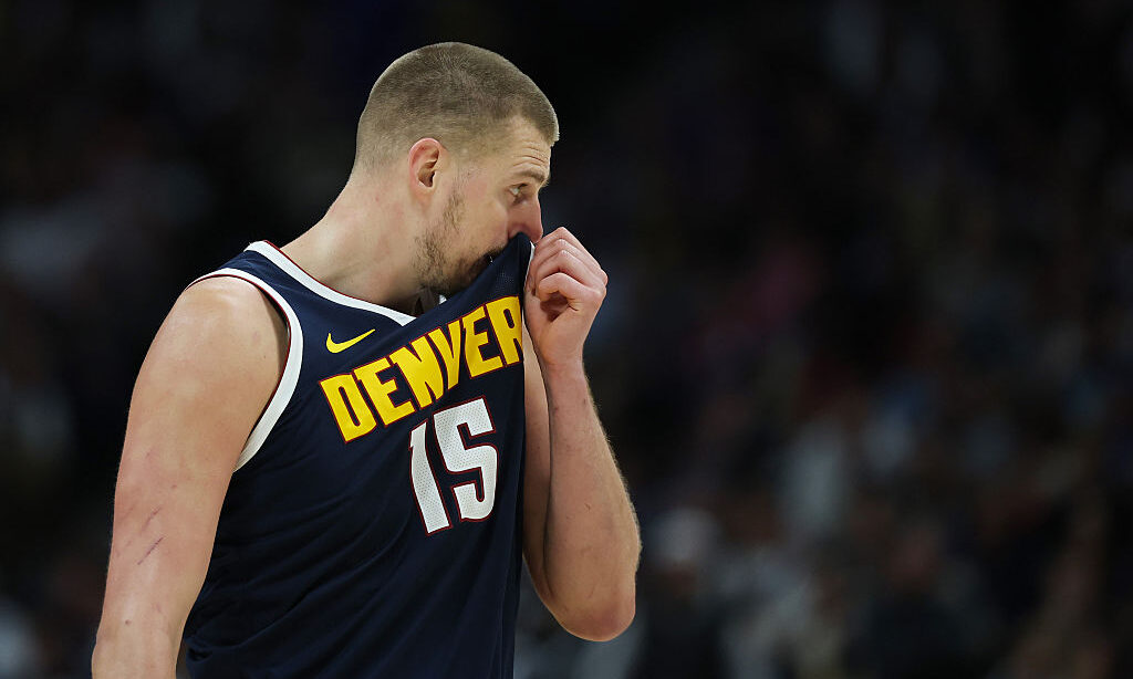 DENVER, COLORADO - APRIL 27: Nikola Jokic #15 of the Denver Nuggets reacts during the third quarter...