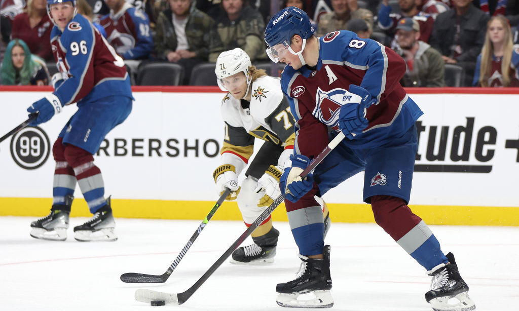 DENVER, COLORADO - NOVEMBER 27: Cale Makar #8 of the Colorado Avalanche advances the puck against W...