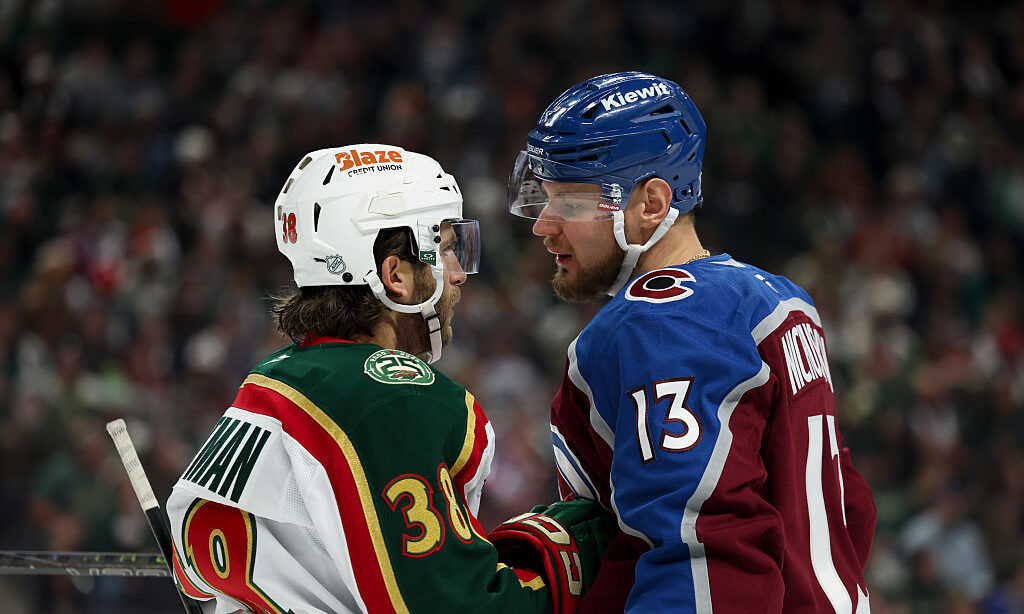 ST PAUL, MINNESOTA - DECEMBER 21: Ryan Hartman #38 of the Minnesota Wild and Valeri Nichushkin #13 ...