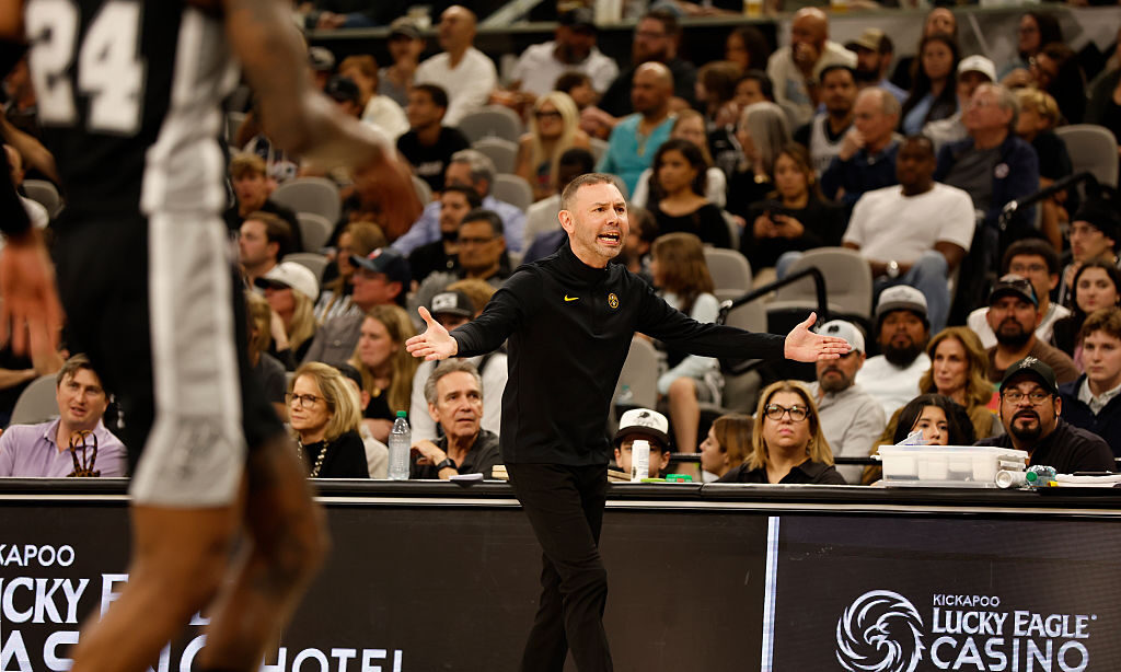 SAN ANTONIO, TX -MARCH 12: David Adelman head coach of the Denver Nuggets argues a call against the...