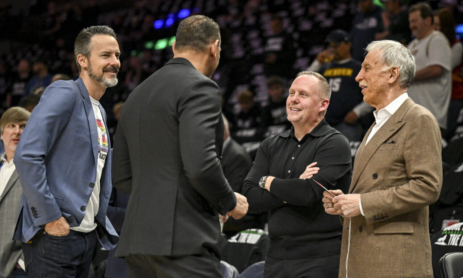 MINNEAPOLIS , MN - APRIL 25: President of the Nuggets Josh Kroenke and owner Stan Kroenke speak wit...