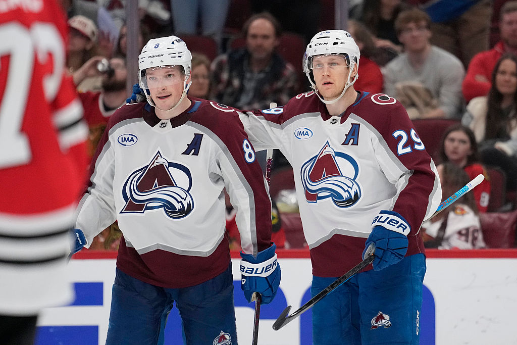 CHICAGO, ILLINOIS - APRIL 02: Cale Makar #8 of the Colorado Avalanche celebrates with teammate Nath...