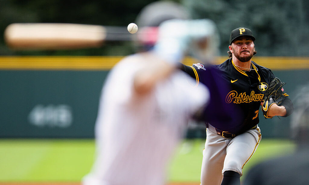 DENVER, CO - AUGUST 2: Starting pitcher Paul Skenes #30 of the Pittsburgh Pirates delivers a pitch ...