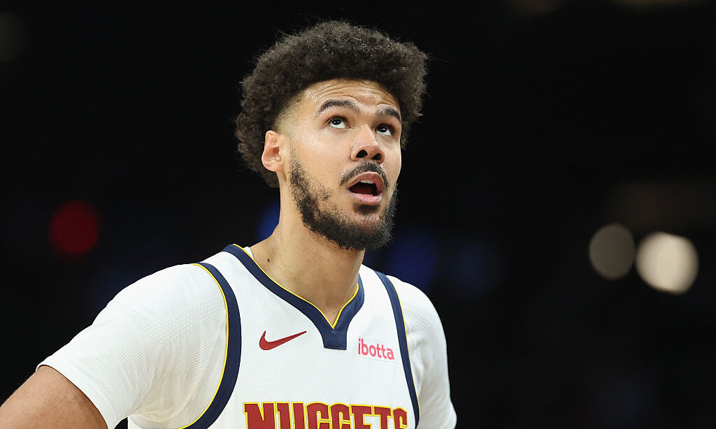 PHOENIX, ARIZONA - MARCH 24: Cameron Johnson #23 of the Denver Nuggets during the first half of the...