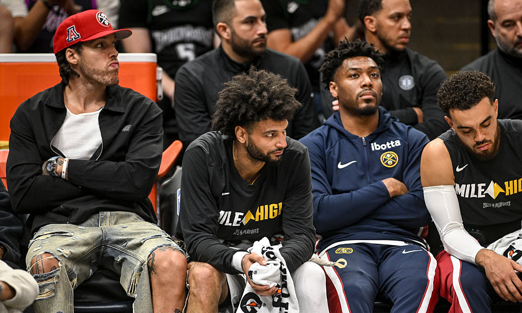 MINNEAPOLIS , MN - APRIL 23: Aaron Gordon (32), Jamal Murray (27), Jalen Pickett (24) and Tyus Jone...