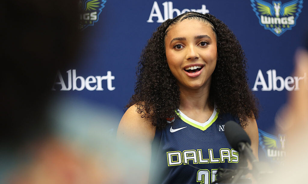 ARLINGTON, TEXAS - APRIL 27: Azzi Fudd #35 of the Dallas Wings responds to media questions during 2...