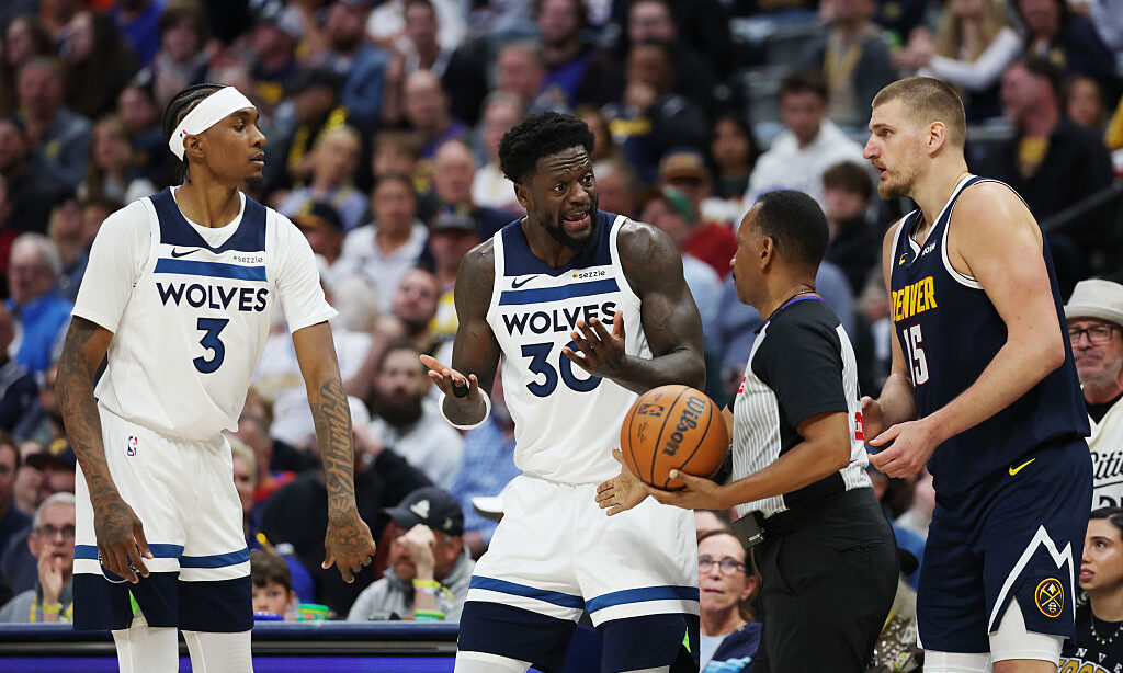 DENVER, COLORADO - APRIL 27: Julius Randle #30 of the Minnesota Timberwolves reacts in front of ref...