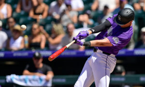 Rockies hit 100 games on pace to avoid 100 losses after overpowering Reds