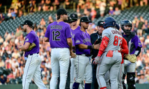 Rockies bombed early and late on a heated night at Coors Field