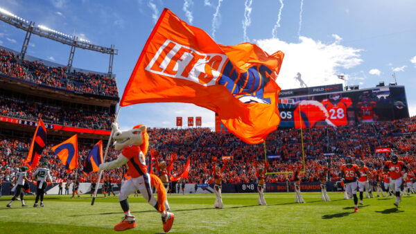 DENVER, COLORADO - OCTOBER 23: Denver Broncos mascot Miles leads the team onto the field before the game against the New York Jets at Empower Field At Mile High on October 23, 2022 in Denver, Colorado.