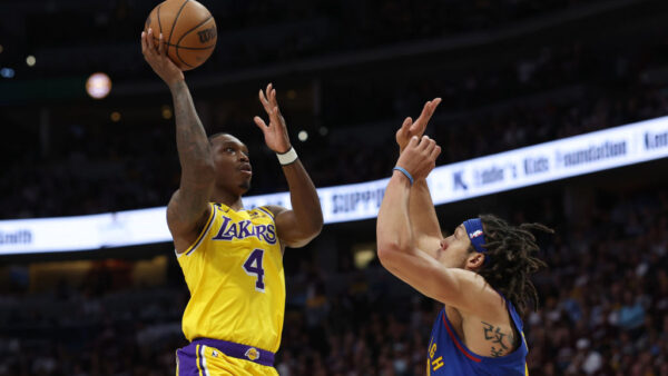 DENVER, COLORADO - MAY 16: Lonnie Walker IV #4 of the Los Angeles Lakers shoots the ball against Aaron Gordon #50 of the Denver Nuggets during the first quarter in game one of the Western Conference Finals at Ball Arena on May 16, 2023 in Denver, Colorado. NOTE TO USER: User expressly acknowledges and agrees that, by downloading and or using this photograph, User is consenting to the terms and conditions of the Getty Images License Agreement.