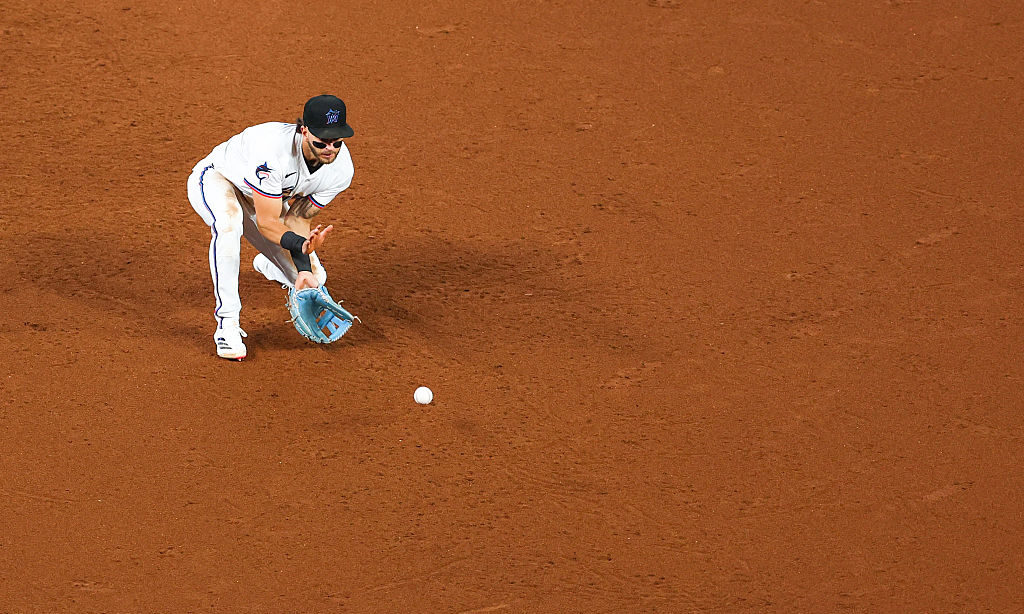 MIAMI, FLORIDA - JUNE 04: Connor Norby #1 of the Miami Marlins fields a hit against the Colorado Ro...