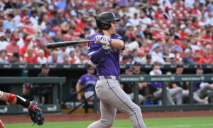 Rockies sprint in front on first pitch, power past Cardinals