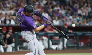 Karros goes into concussion protocol, but not before his 2-run homer powers Rockies to win