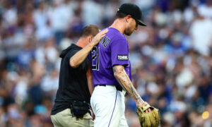 Freeland leaves due to neck tightness as Rockies fall in extra innings