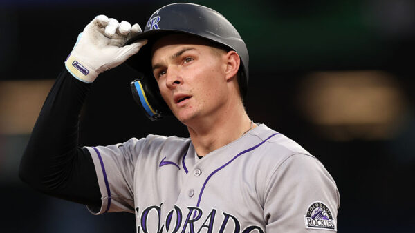 WASHINGTON, DC - AUGUST 24: Mickey Moniak #22 of the Colorado Rockies reacts after striking out against the Washington Nationals during the third inning at Nationals Park on August 24, 2026 in Washington, DC.
