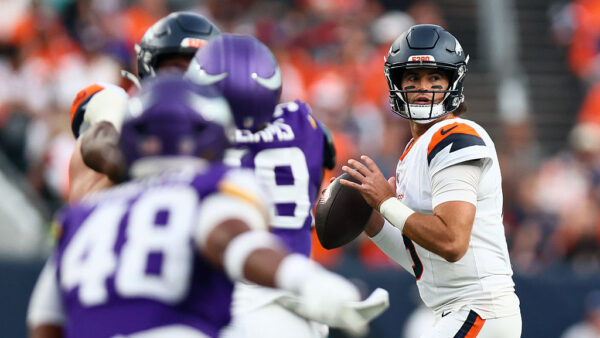 DENVER, CO - AUGUST 28: Jarrett Stidham #8 of the Denver Broncos looks to pass during the first quarter against the Minnesota Vikings in a preseason game at Empower Field at Mile High on August 28, 2026 in Denver, Colorado.