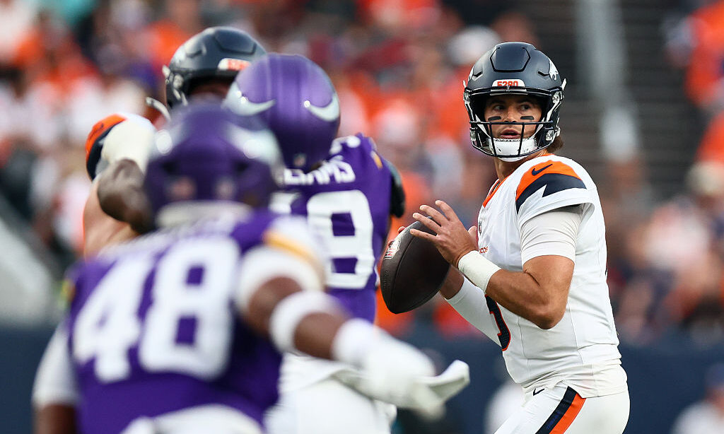 DENVER, CO - AUGUST 28: Jarrett Stidham #8 of the Denver Broncos looks to pass during the first qua...