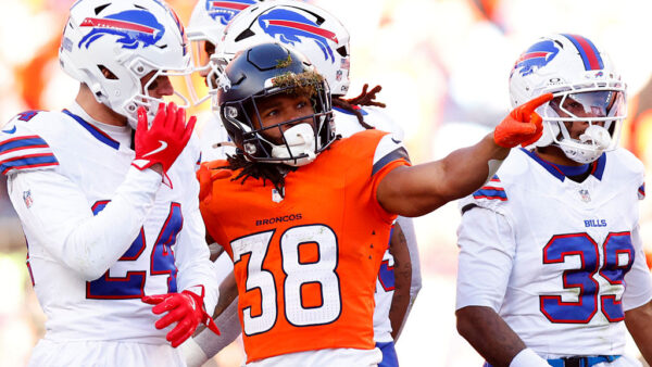 DENVER, COLORADO - JANUARY 17: Jaleel McLaughlin #38 of the Denver Broncos celebrates a first down against the Buffalo Bills during the second quarter in the AFC Divisional Playoff game at Empower Field At Mile High on January 17, 2026 in Denver, Colorado.