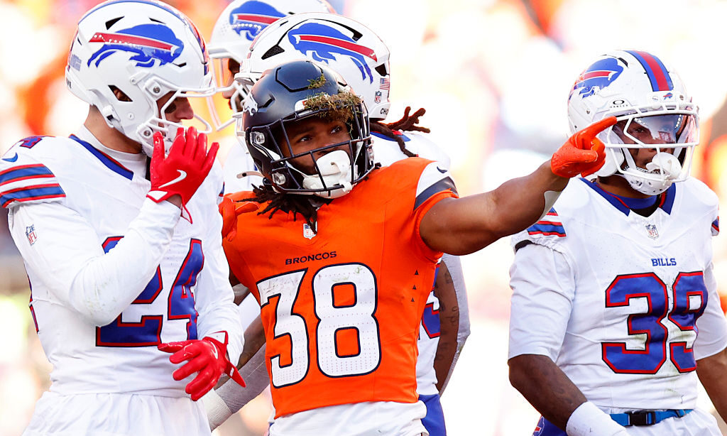 DENVER, COLORADO - JANUARY 17: Jaleel McLaughlin #38 of the Denver Broncos celebrates a first down against the Buffalo Bills during the second quarter in the AFC Divisional Playoff game at Empower Field At Mile High on January 17, 2026 in Denver, Colorado.