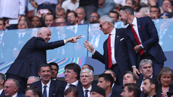 BUDAPEST, HUNGARY - MAY 30: Gianni Infantino, President of FIFA, interacts with Josh Kroenke, Co-Chair of Arsenal, and Stan Kroenke, Owner of Kroenke Sports & Entertainment, prior to the UEFA Champions League Final 2026 match between Paris Saint-Germain and Arsenal FC at Puskas Arena on May 30, 2026 in Budapest, Hungary.