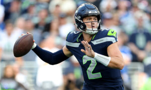 Ex-Broncos QB Lock steps in for injured Darnold with mistake-free play