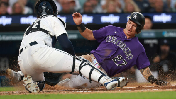 Rockies outfielder Jordan Beck is thrown out at home plate