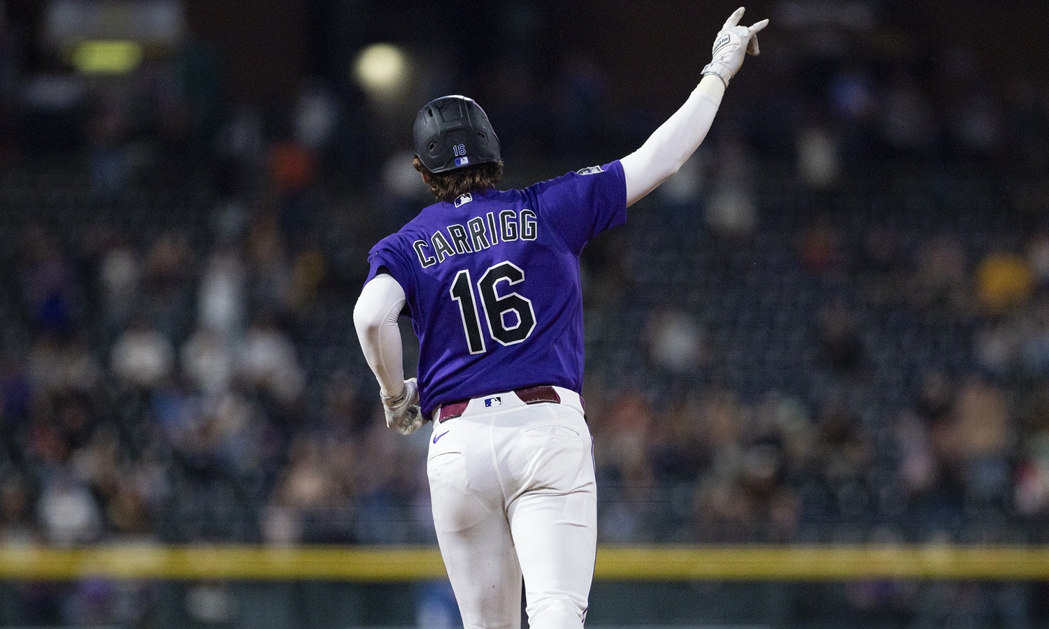 Rockies outfielder Cole Carrigg...