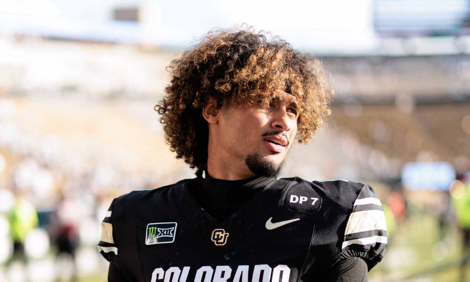 BOULDER, COLORADO - SEPTEMBER 12: Julian Lewis #10 of the Colorado Buffaloes walks off the field af...