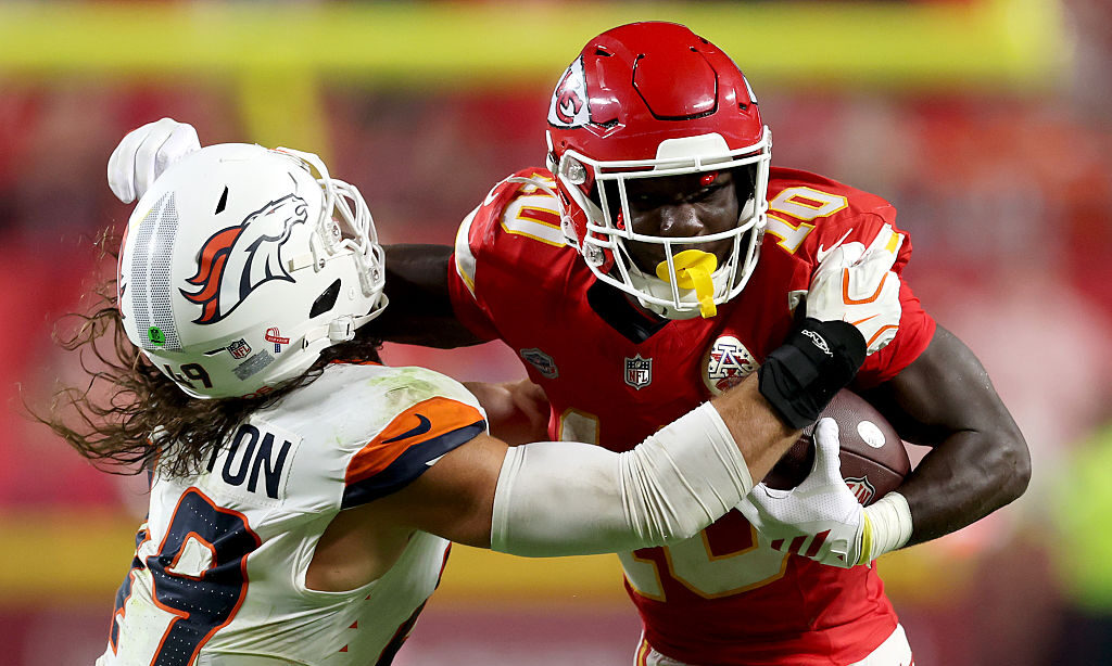 KANSAS CITY, MISSOURI - SEPTEMBER 14: Emmett Johnson #10 of the Kansas City Chiefs runs with the ba...