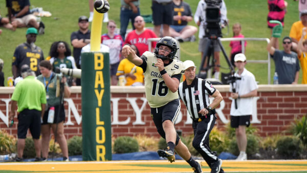 WACO, TEXAS - SEPTEMBER 26: Isaac Wilson #16 of the Baylor Bears throws a pass during the second half against the Colorado Buffaloes at McLane Stadium on September 26, 2026 in Waco, Texas.