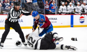 Nathan MacKinnon throws down in epic fight, scores twice in wild Avs opening win
