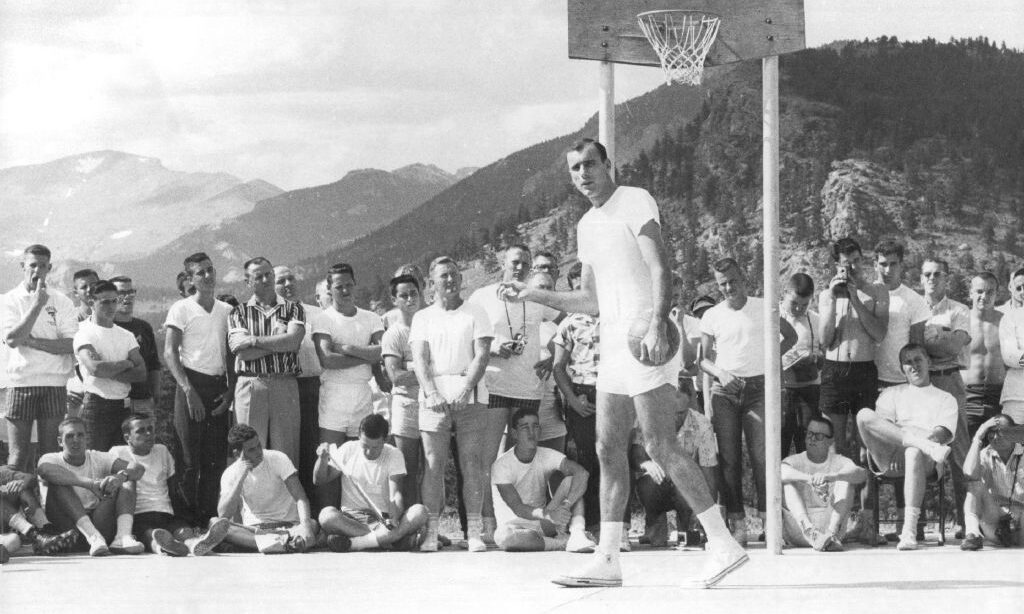 AUG 17 1959, AUG 18 1959 Bob Pettit (with ball), all-pro forward with the St. Louis Hawks, conducts a basketball clinic for part of the 625 athletes at the camp. In photo at left, ***** Credit: Denver Post